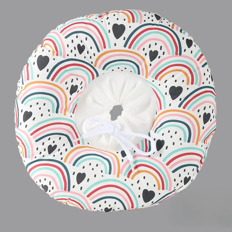 A colorful, rainbow-patterned soft cotton recovery collar alternative for dogs and cats.