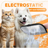 A white dog is using an electrostatic pet hair remover glove on its fur.