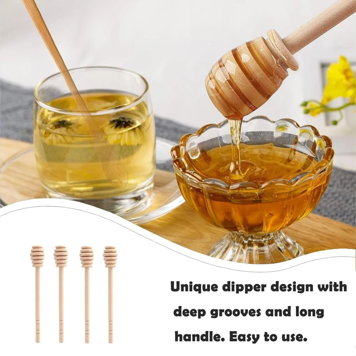 A wooden honey dipper with a long handle is shown pouring golden honey into a glass bowl.