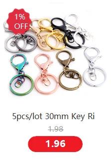 A set of five gold and silver plated key rings or ball necklaces for sale.