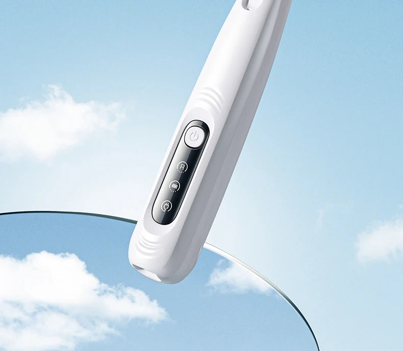 A white portable dog grooming trimmer is shown against a bright blue sky with clouds.