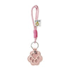 Pink refillable pet hair keychain with a cat paw charm
