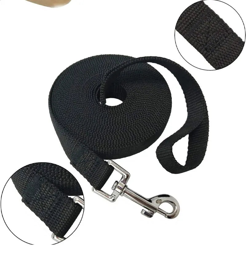 Black nylon dog training leash with a solid color long lead and metal clip.