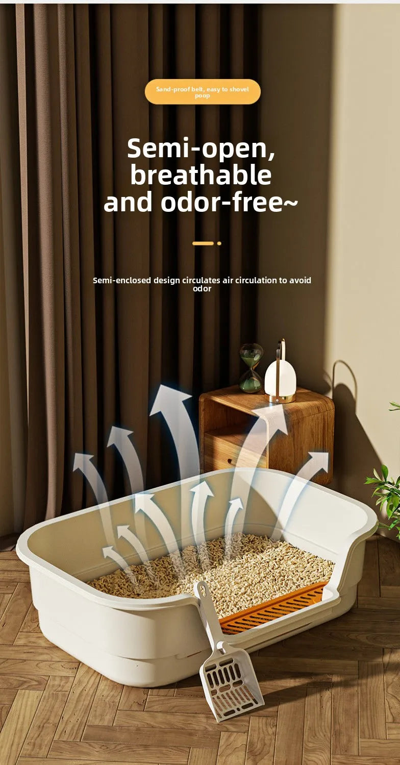 A white semi-enclosed cat litter box is shown with loose litter inside, demonstrating its design for odor control.