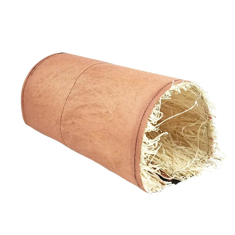 A rolled natural grass tunnel hideout for small pets in a light tan color.