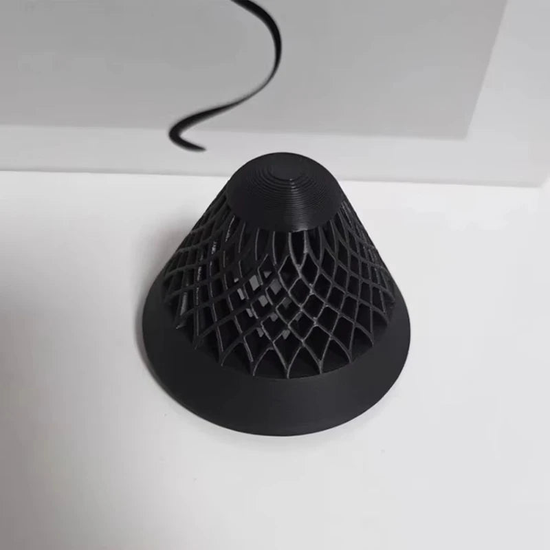 A black, conical floating aquarium plant pot with a diamond lattice texture.