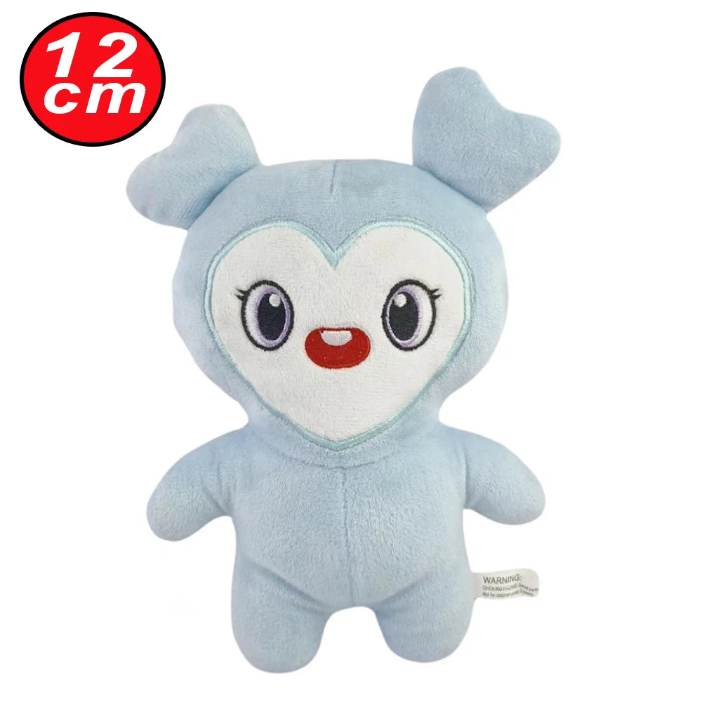 Light blue kawaii Momo plush toy with large eyes and a heart shape on the chest