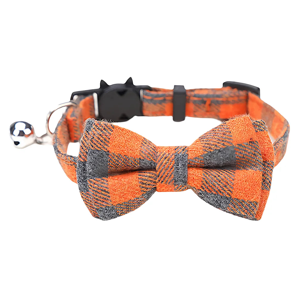 An orange and gray plaid bow tie collar for cats and small dogs.