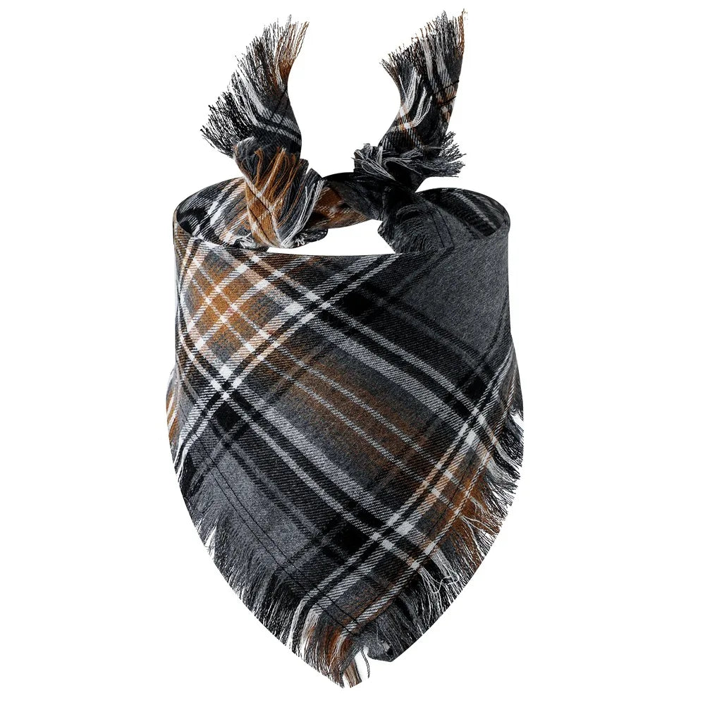 A plaid fabric bandana featuring brown, black, and gray tones with fringed ties.