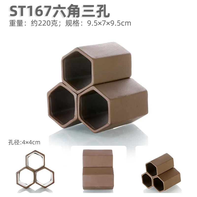 A set of natural clay aquarium cave decorations shaped like hexagons and rectangular blocks.