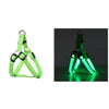 A bright green rechargeable LED dog harness with a mesh strap is shown in two views.