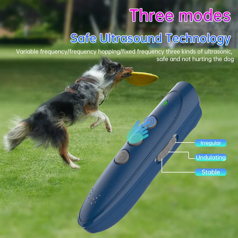 A blue ultrasonic dog bark deterrent device is shown next to a dog in a grassy outdoor setting.