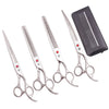 A set of professional stainless steel pet grooming scissors and comb in a black case.