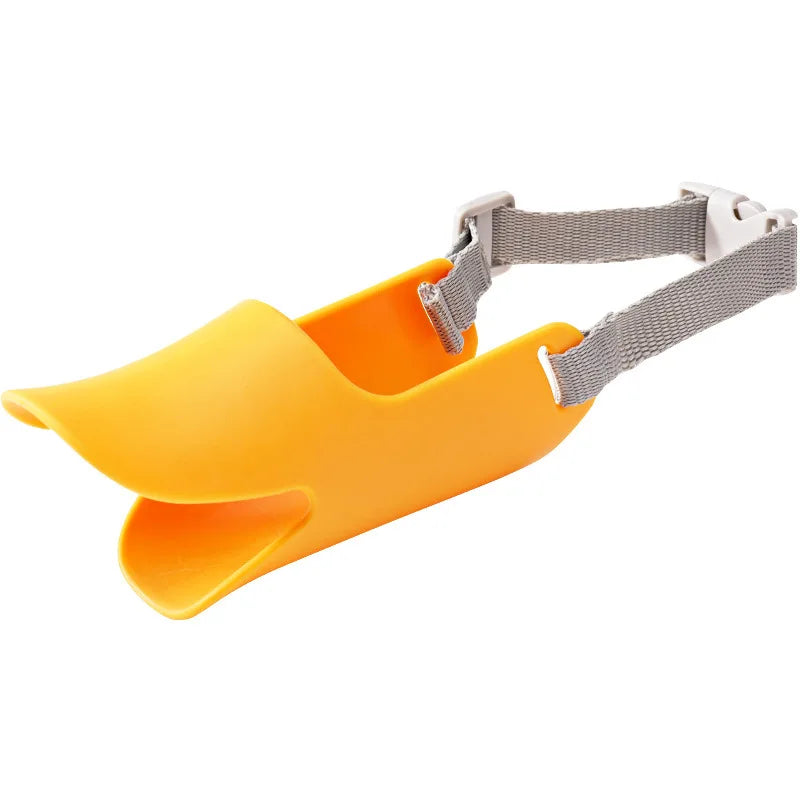 Orange silicone duck-shaped dog muzzle with gray adjustable strap