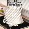 Detachable easy to clean pet litter box grate shown being used in a litter tray