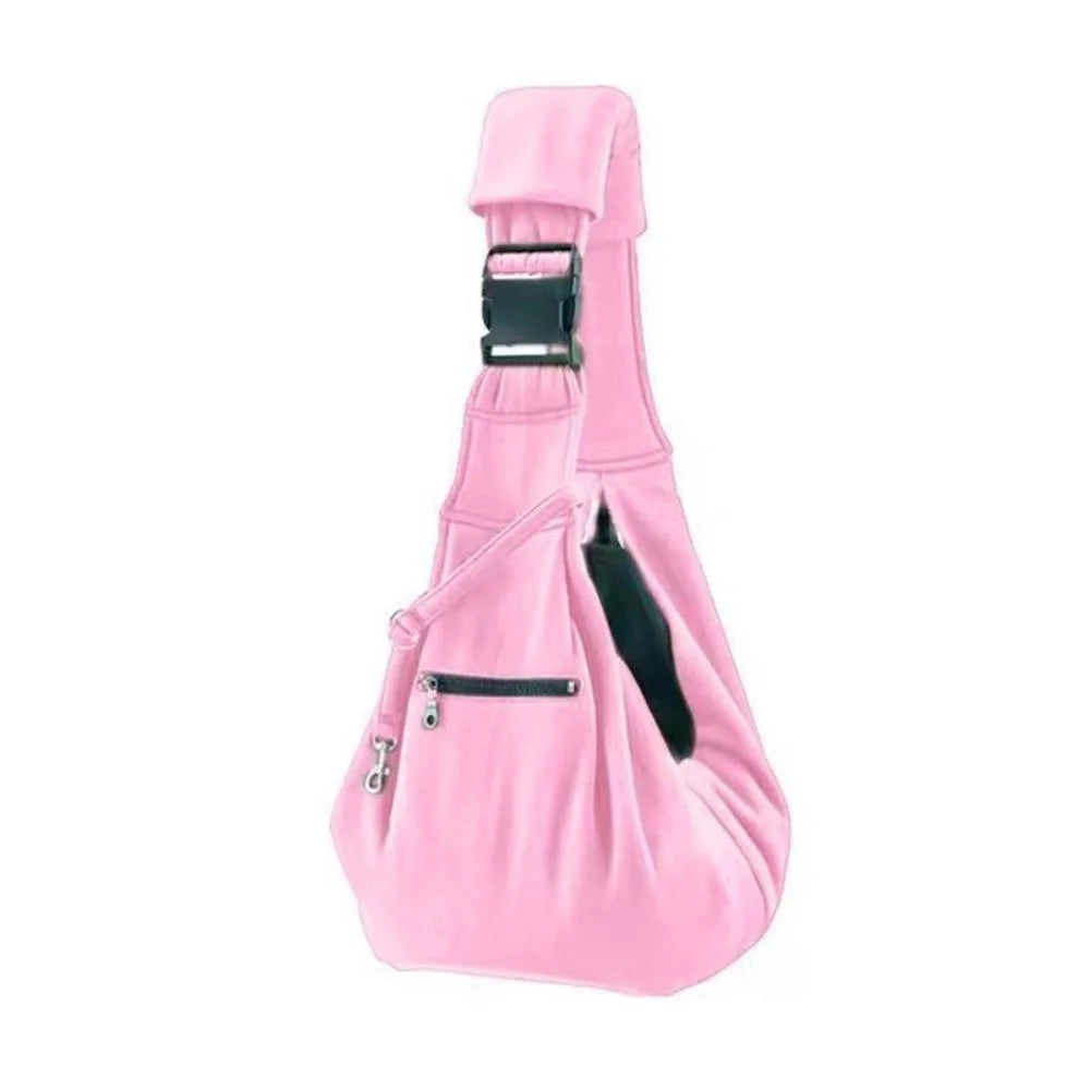 Pink double-sided pet carrier bag with a black safety harness