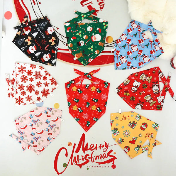 A collection of festive pet scarves and drool bibs featuring Christmas patterns for cats and small dogs.