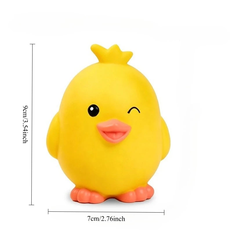 A yellow latex squeaky duck toy with a smiling face and orange feet.