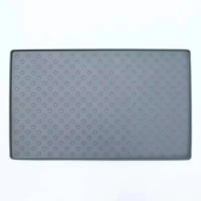 Gray waterproof silicone pet feeding mat with a textured pattern for dogs and cats