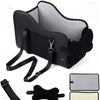 Black cozy center console car seat for small dogs with attached harness and padding