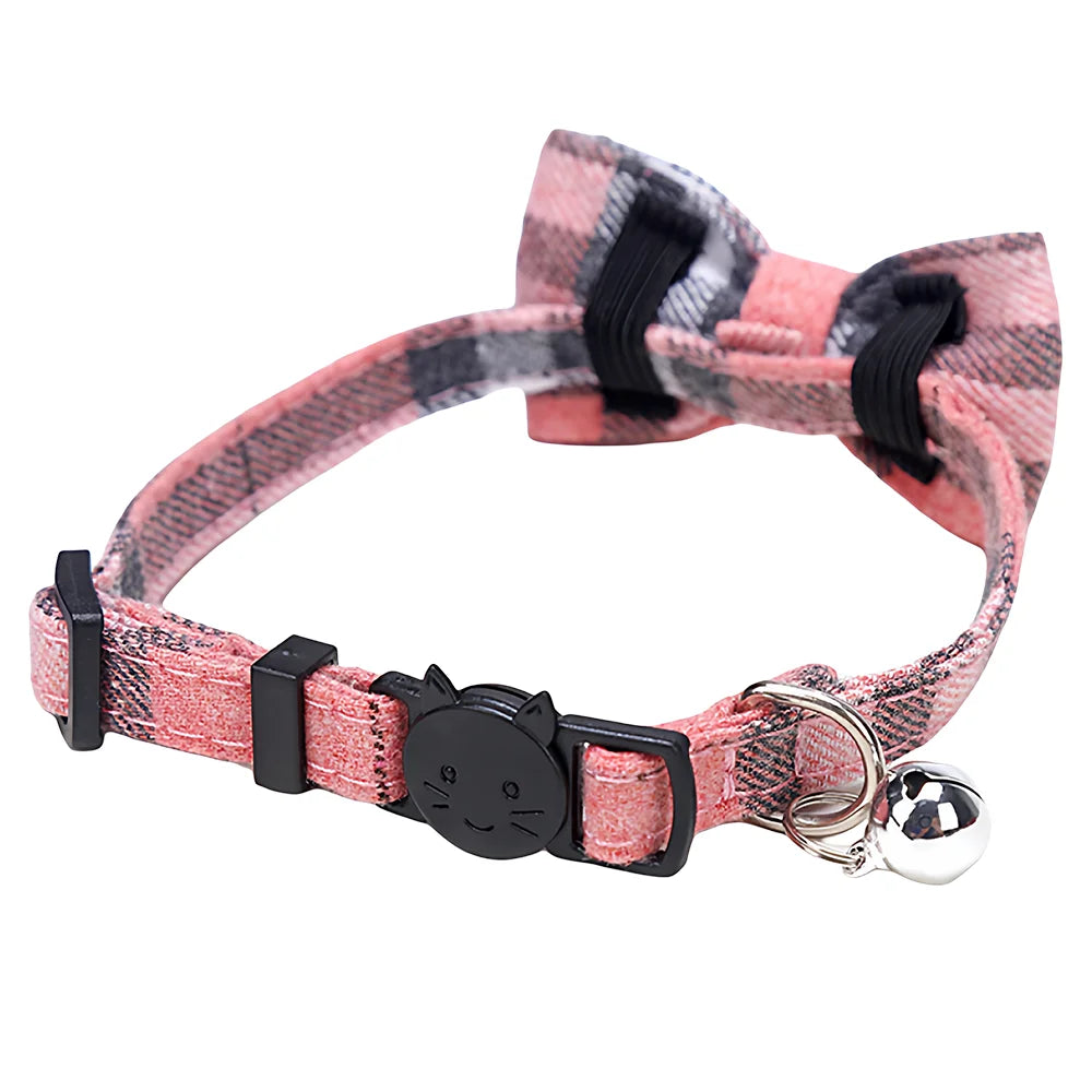 Pink plaid bow tie collar for cats and small dogs with a silver bell.
