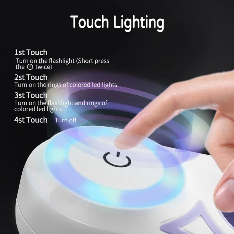 A hand is touching a white electronic device that illuminates colored LED lights.