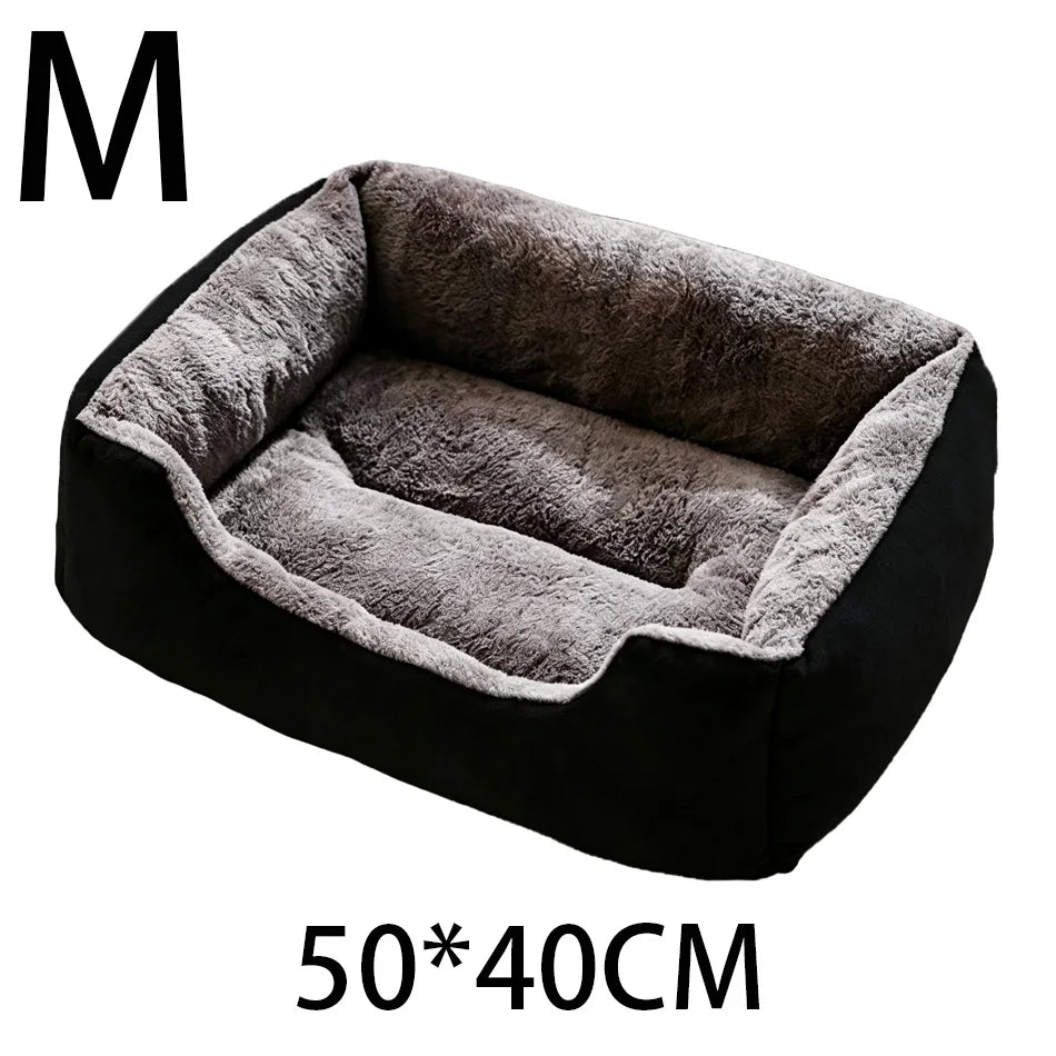 A black plush pet bed with a gray faux fur lining and anti-slip base, shown from above.