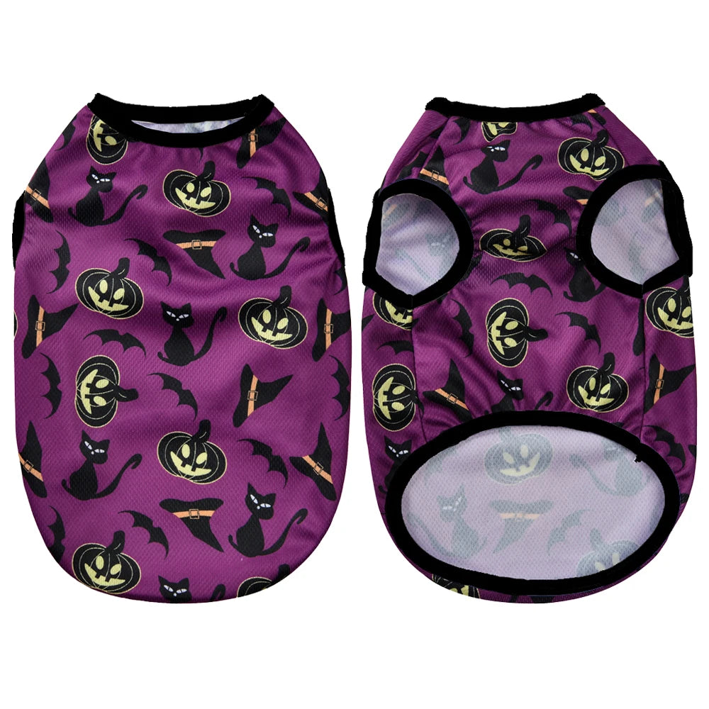 A purple pet shirt featuring a repeating pattern of black cats and Halloween pumpkins.