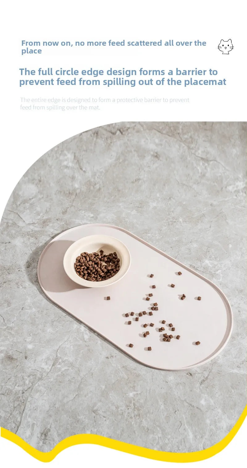 A feeding mat with a full circle edge design is shown on a marble surface, preventing feed from spilling.