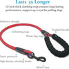 A close-up view of a red climbing rope leash with reflective threads, a padded handle, and various components like a waste ba