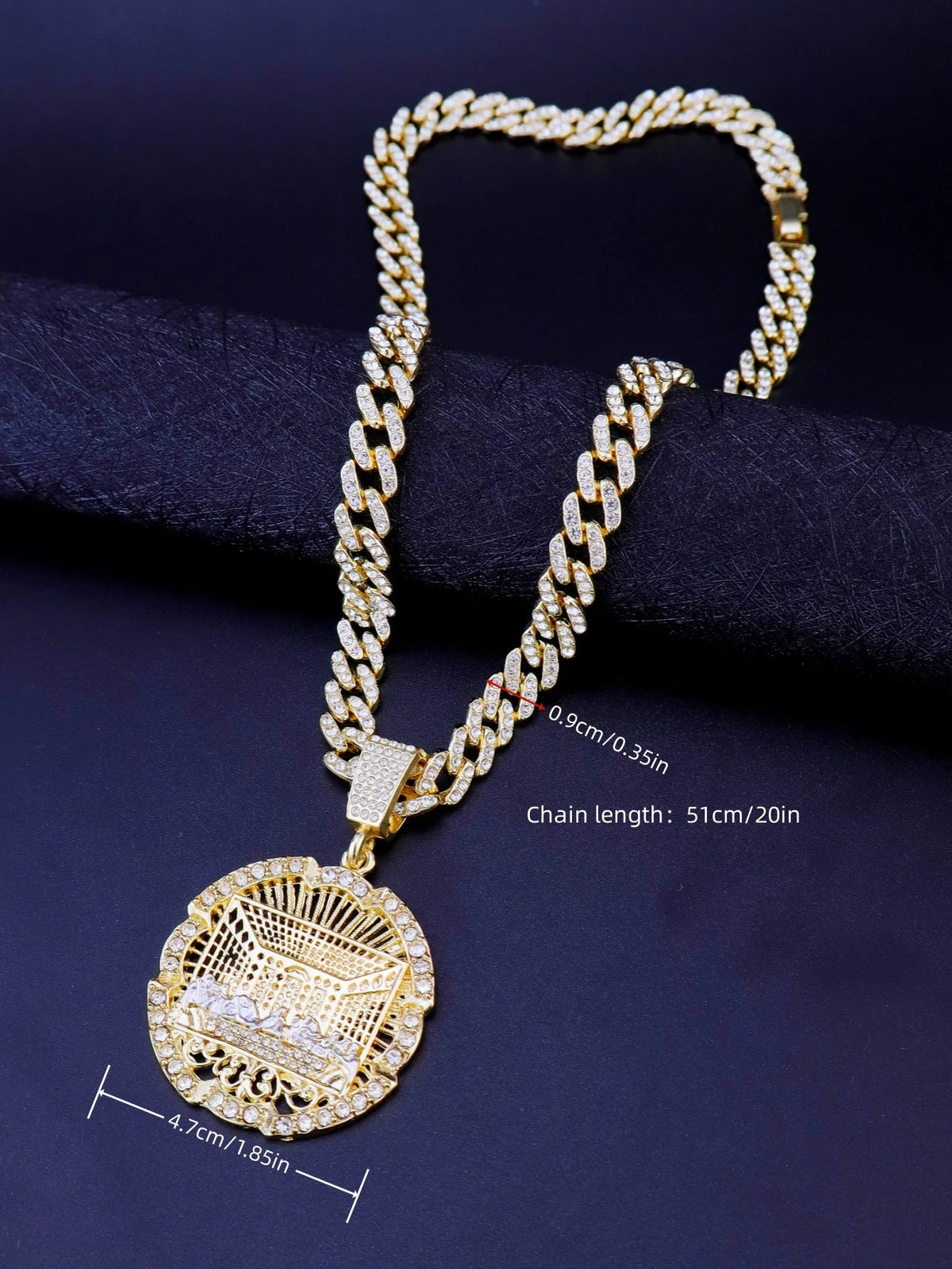 A gold plated last supper medallion necklace featuring a Cuban chain and a detailed pendant.