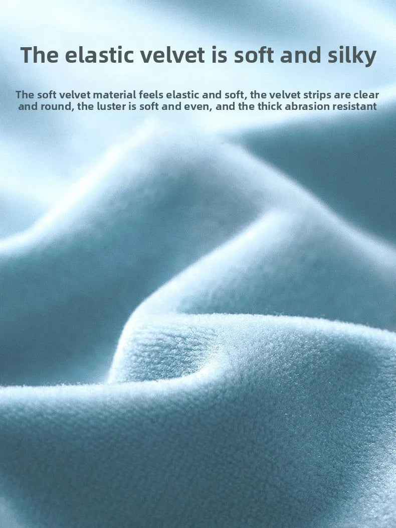 Close-up of soft, silky velvet fabric with subtle folds and texture.