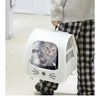 A person is holding a white breathable pet carrier backpack for cats and small dogs.