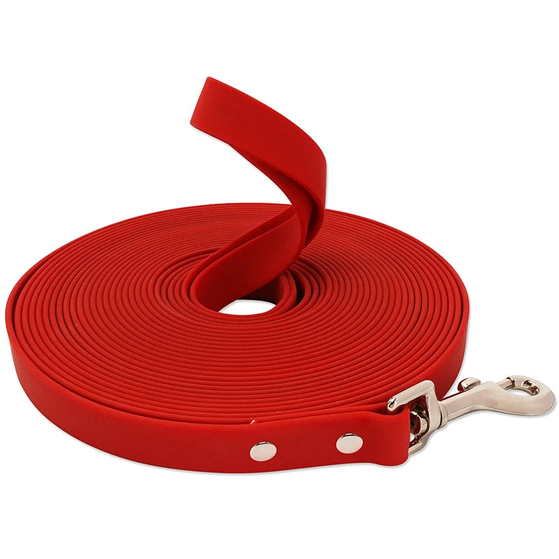 A roll of red heavy-duty waterproof dog leash with a buckle attached.