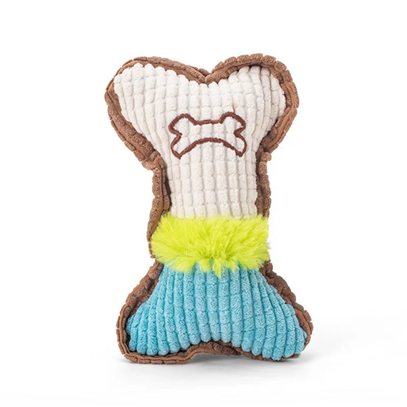 A plush dog toy shaped like a bone, featuring brown and beige fabric with a bright yellow and blue accent.