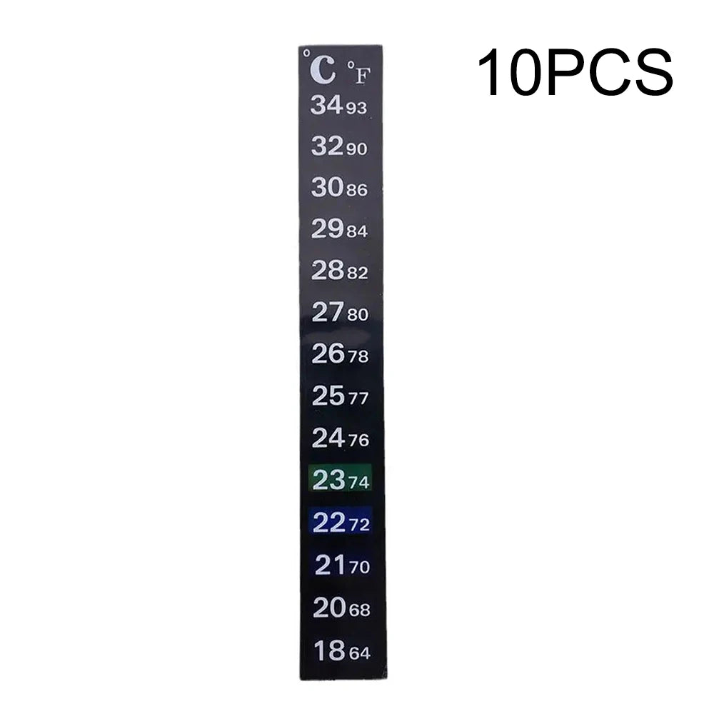 Vertikaler Streifen eines Aquariumthermometers mit Temperaturangaben in Celsius und Fahrenheit.