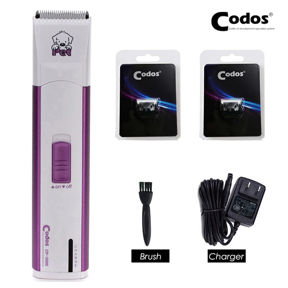 A white and purple electric pet grooming clipper set including the device, brush, and charger.