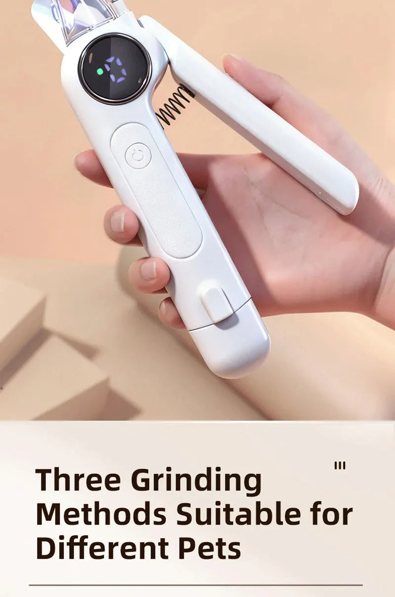 A hand holds a white LED pet nail clipper and grinder device, showing its design and function.