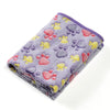 A purple fleece pet blanket featuring a pattern of pink, yellow, and purple paw prints.
