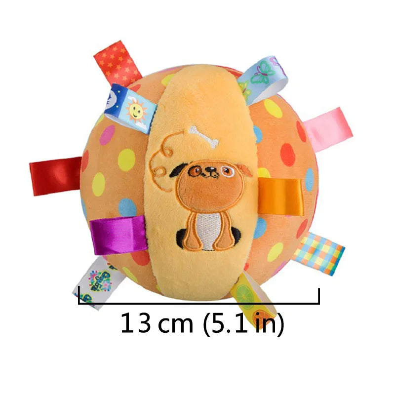 Orange Spielhundball mit bunten Bändern und Nylongriff.