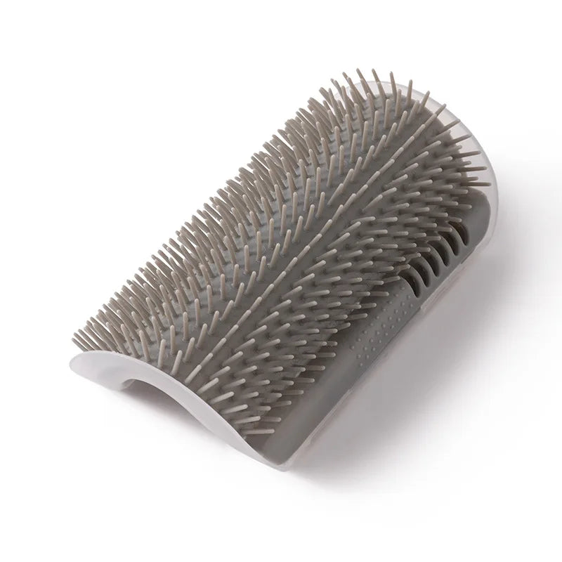 A gray self-grooming cat brush with a corner mount designed for gentle massage and shedding control.