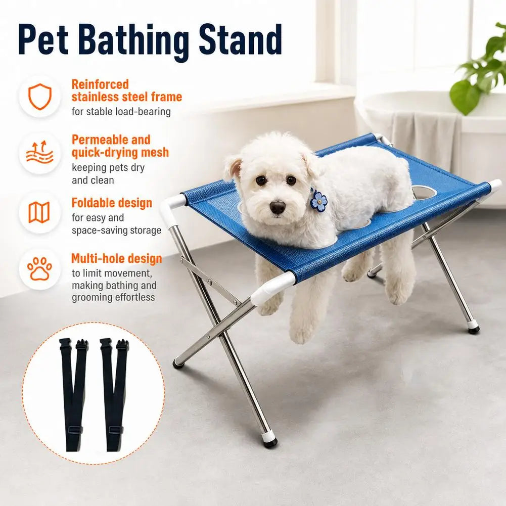 A white dog is resting on a blue mesh hammock pet bathing stand with a reinforced stainless steel frame.