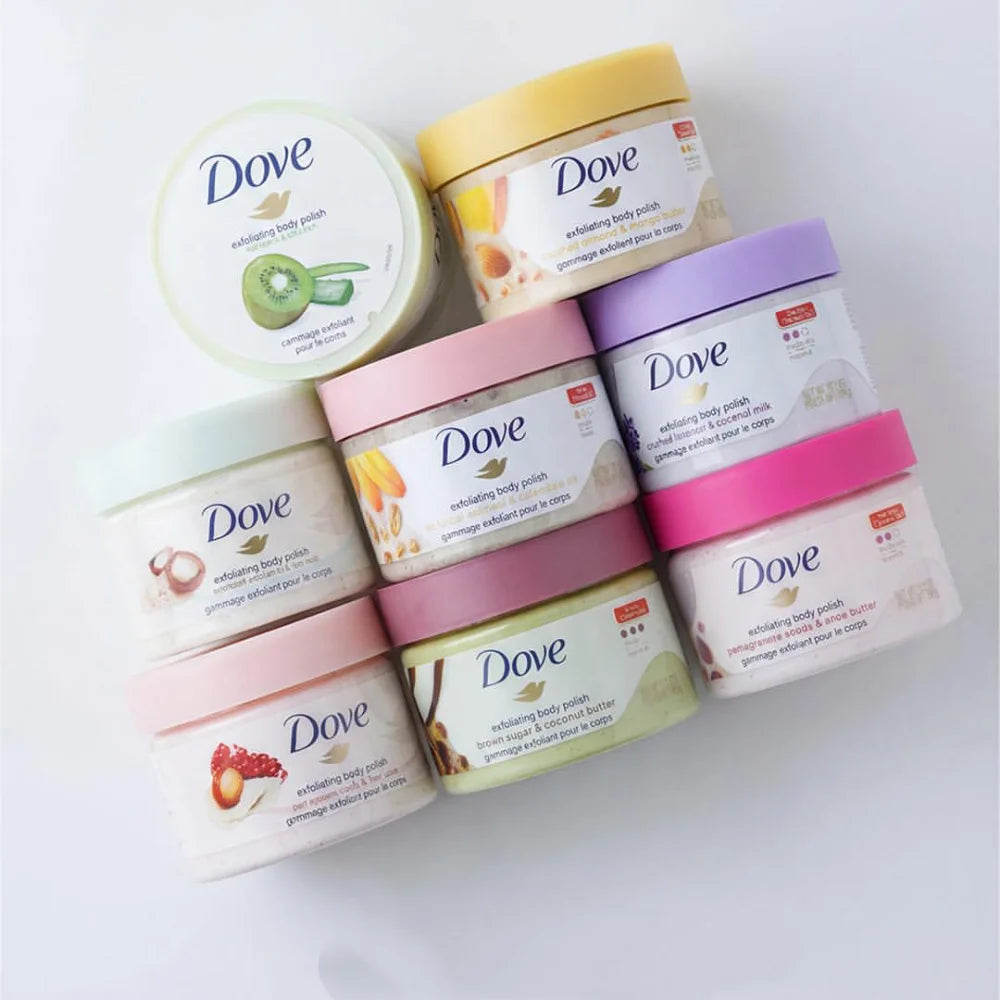 A collection of Dove exfoliating body polish jars in various shades of yellow, pink, and purple.