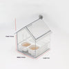 Clear acrylic parrot feeder and bird bath accessory with a slanted roof and multiple seed compartments