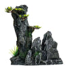 Resin aquarium rockery featuring a cave structure and small tree plants.