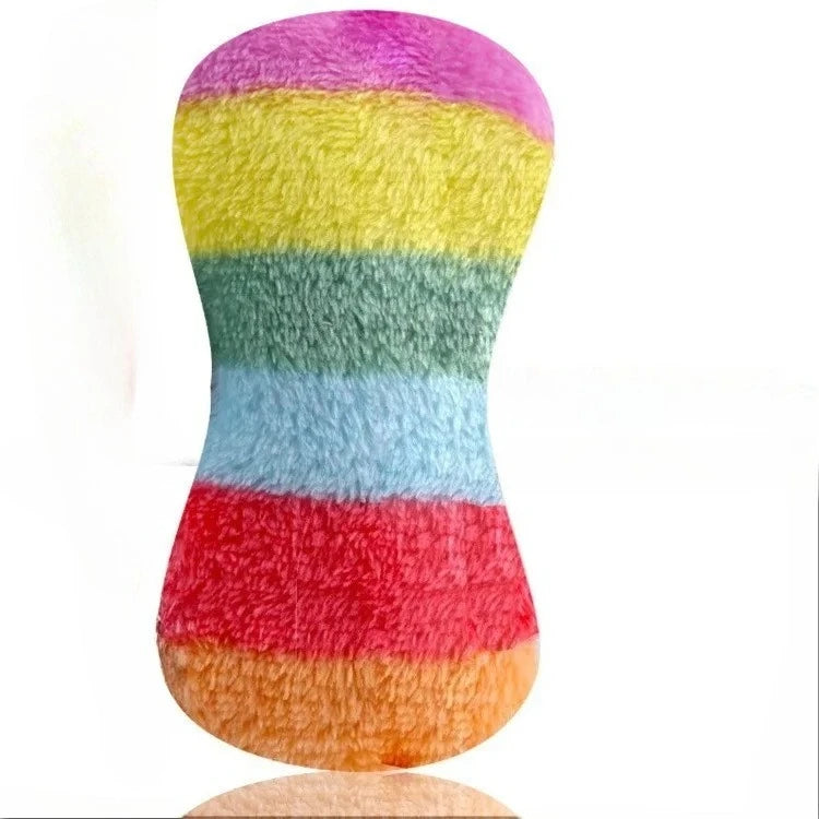 A plush duck dog chew toy in horizontal stripes of purple, yellow, green, blue, and red.