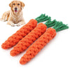 An orange cotton rope dog toy set featuring carrot and dumbbell shaped toys with green tassels.