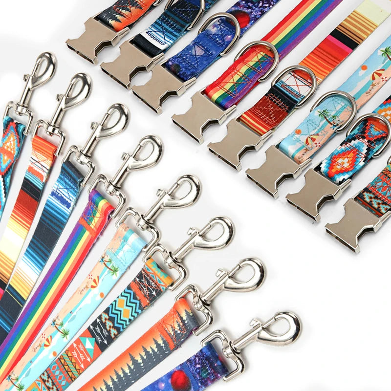 A collection of colorful ethnic striped pattern dog leashes with metal D-rings displayed on a white background.