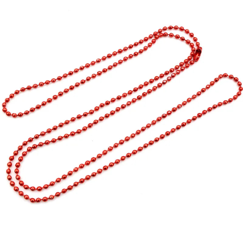 A set of red ball necklaces, featuring gold and silver plating.