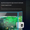 A compact magnetic brush is shown cleaning algae from the glass walls of an aquarium tank.